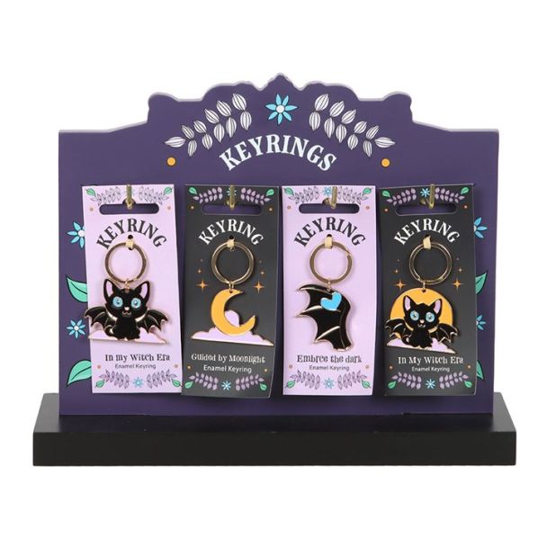 Set of 24 Cute and Creepy Keyrings on Display