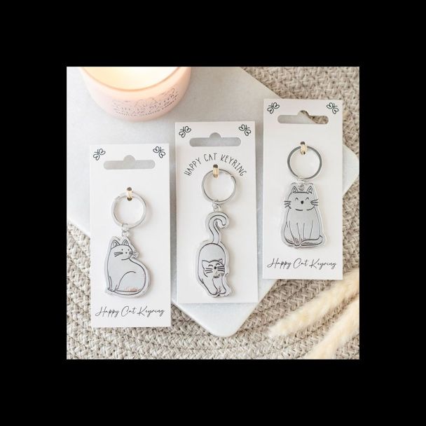 Set of 24 Happy Cat Keyrings on Display
